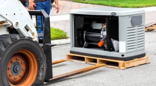 a generator being unloaded carefully for installation